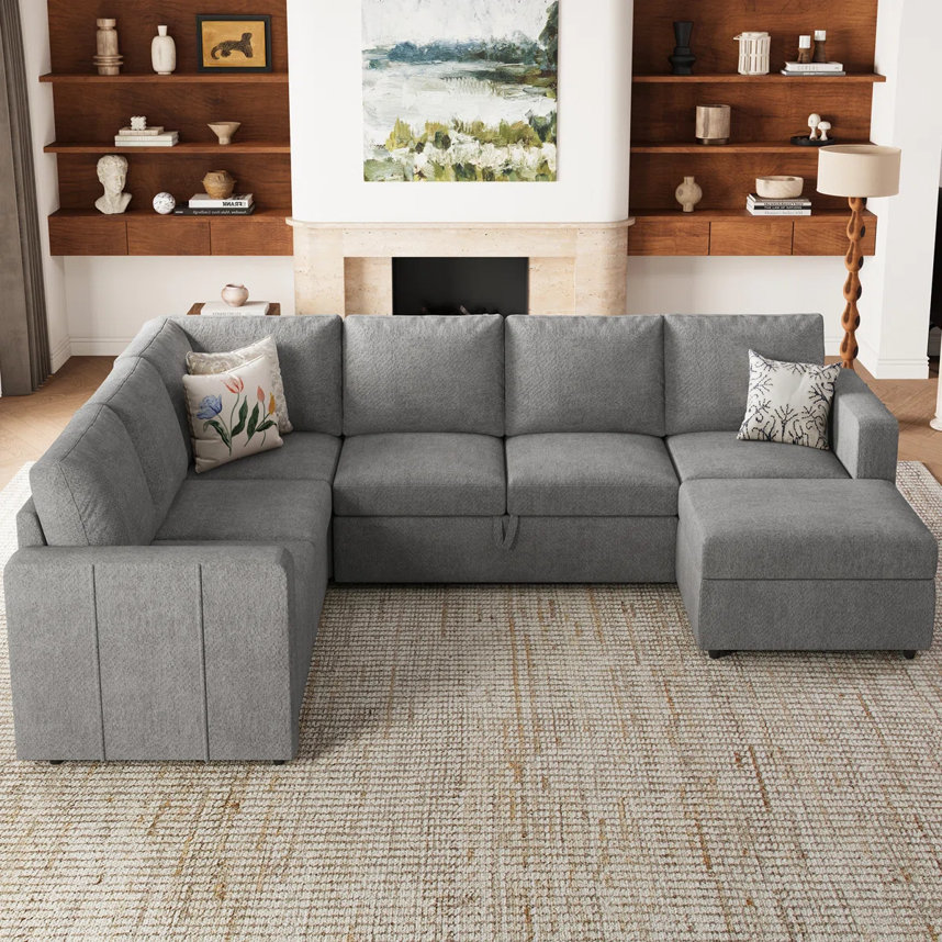 Gray U-shaped sectional sofa with pillows