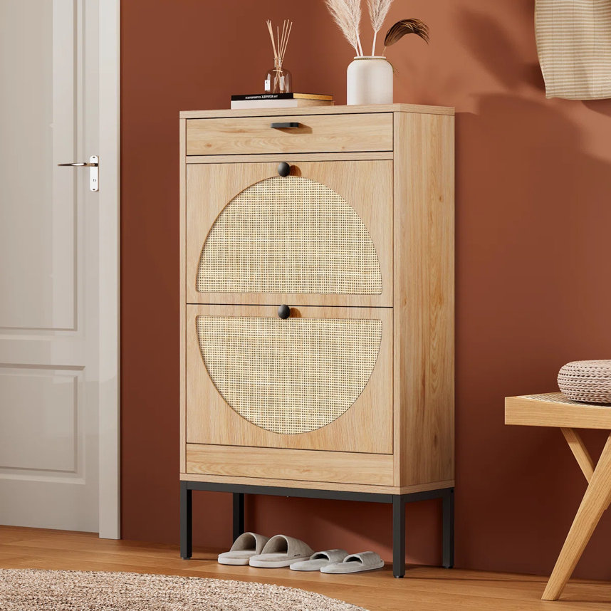 Light-colored wood shoe cabinet with black metal legs.